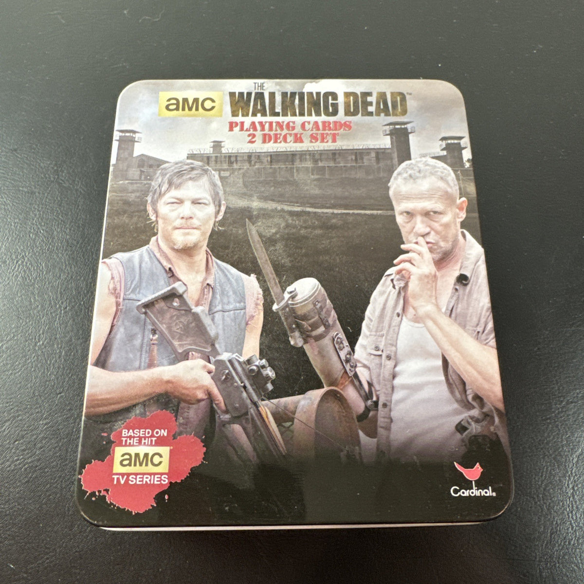 The Walking Dead playing card set with two decks and metal tin by Cardinal featuring Daryl and Merle Dixon.