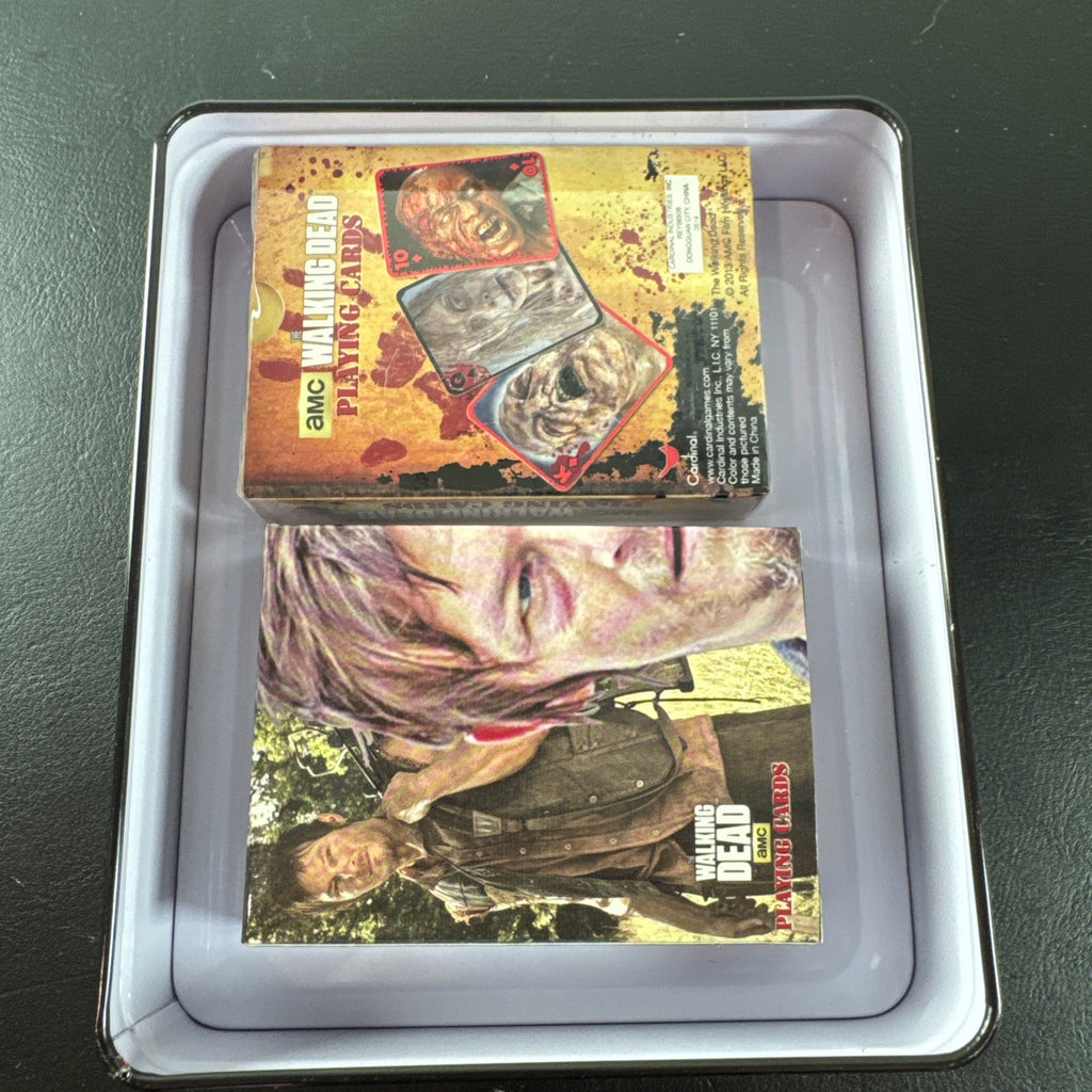 The Walking Dead playing card set with two decks and metal tin by Cardinal featuring Daryl and Merle Dixon.