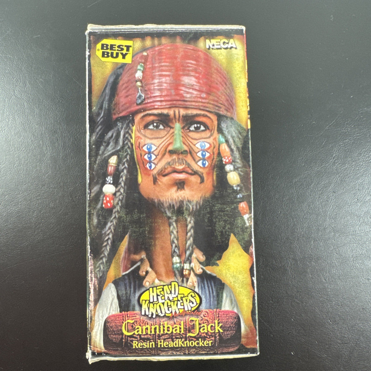 NECA Pirates of the Caribbean Cannibal Jack resin Headknocker bobblehead figure.