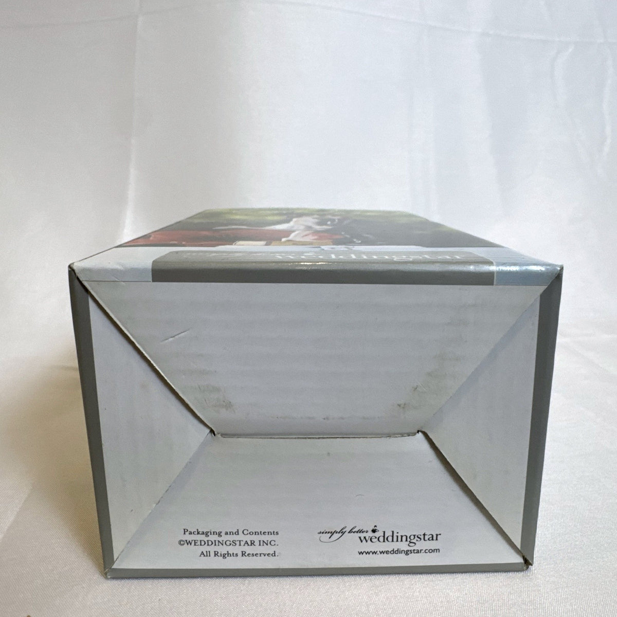 Weddingstar humorous A Kiss and We're Off bride and groom wedding cake topper figurine in original box
