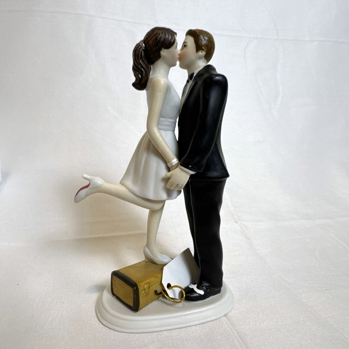 Weddingstar humorous A Kiss and We're Off bride and groom wedding cake topper figurine in original box