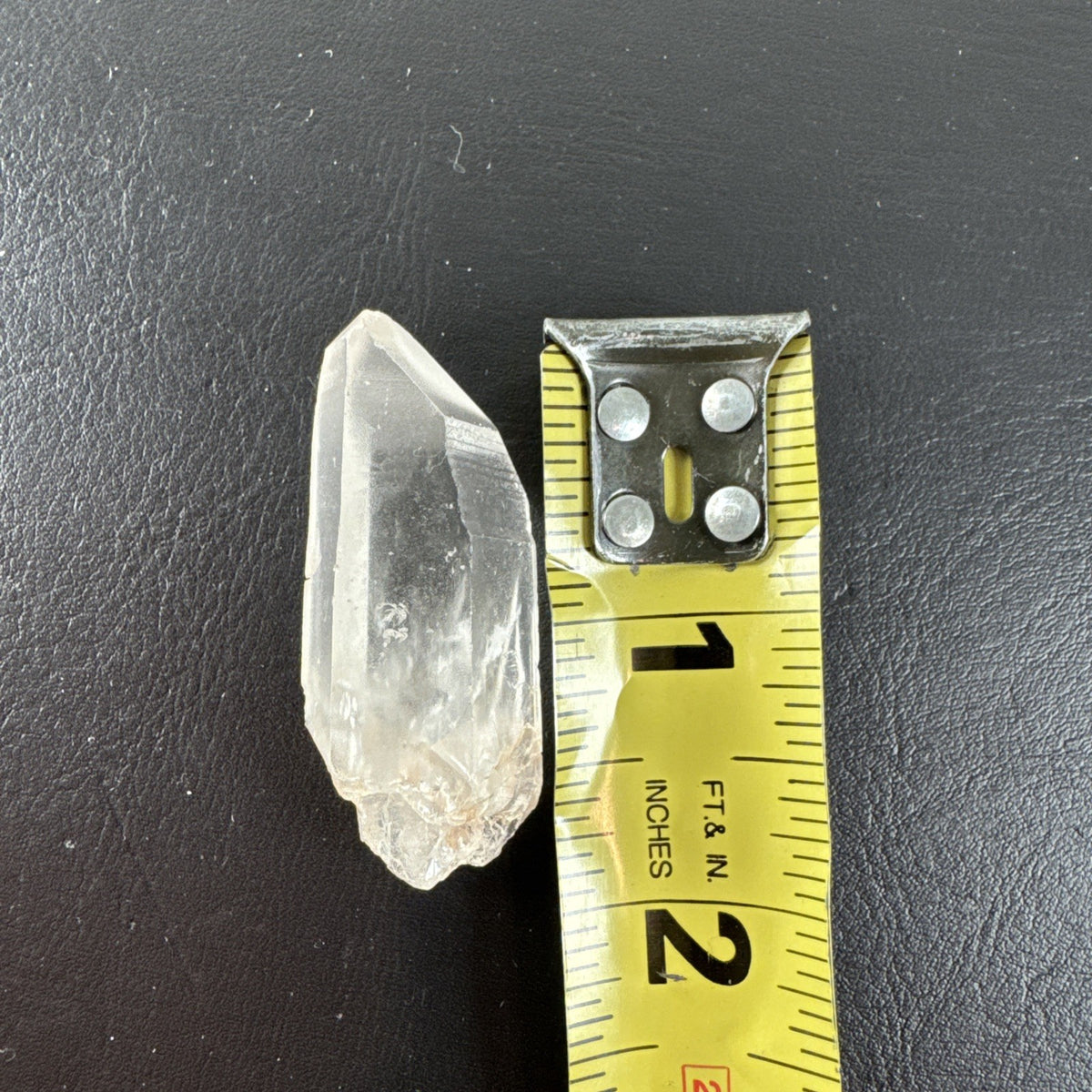 Raw Brazilian Lemurian clear quartz crystal point weighing 24.3g with natural horizontal striations and silver gift box