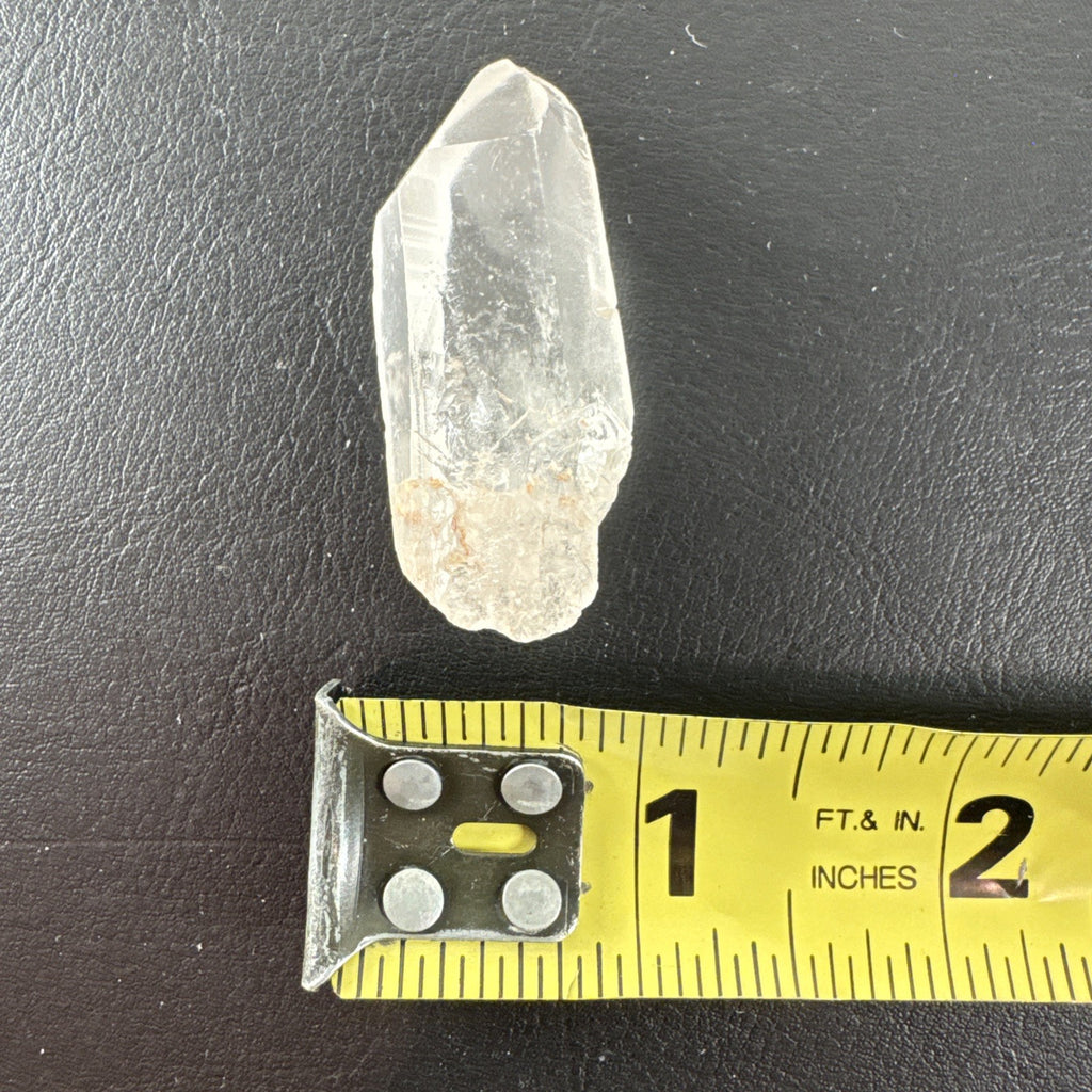 Raw Brazilian Lemurian clear quartz crystal point weighing 24.3g with natural horizontal striations and silver gift box