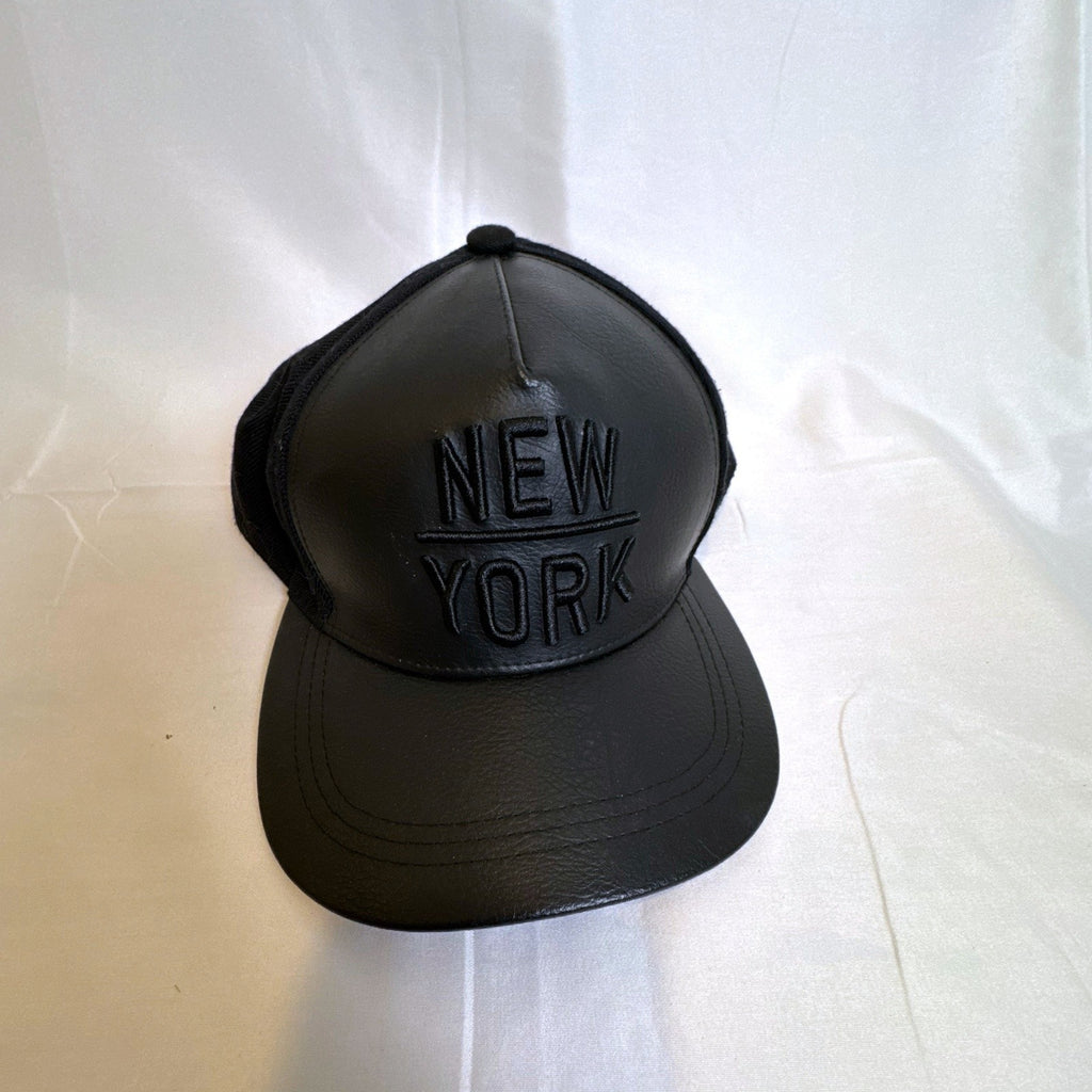 Set of 3 snapback hats including a grey Hurley youth cap, black H&M faux leather hat, and navy blue ROMA cap.