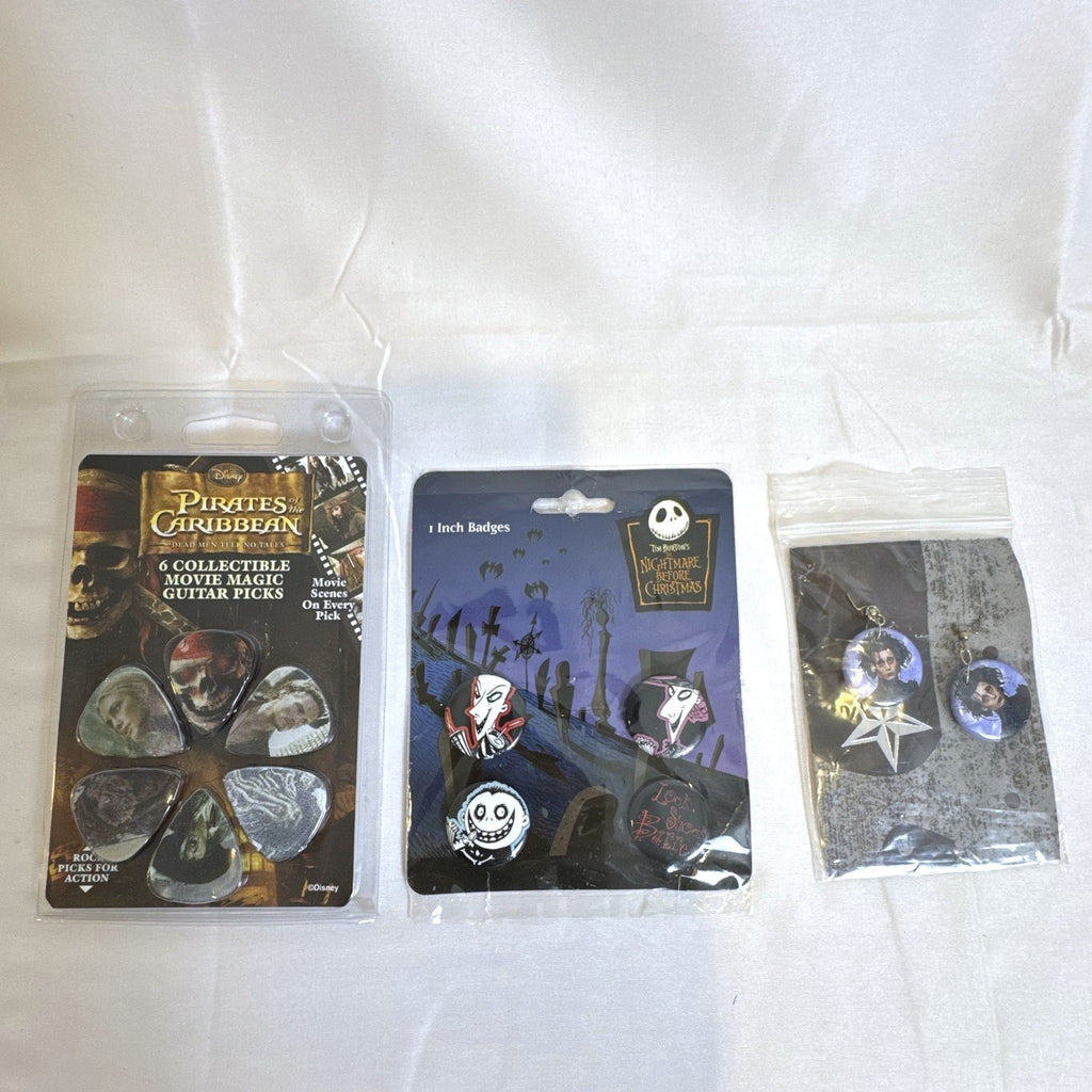 Sealed Disney and Tim Burton accessory set featuring Nightmare Before Christmas pins, Scissorhands earrings, and picks