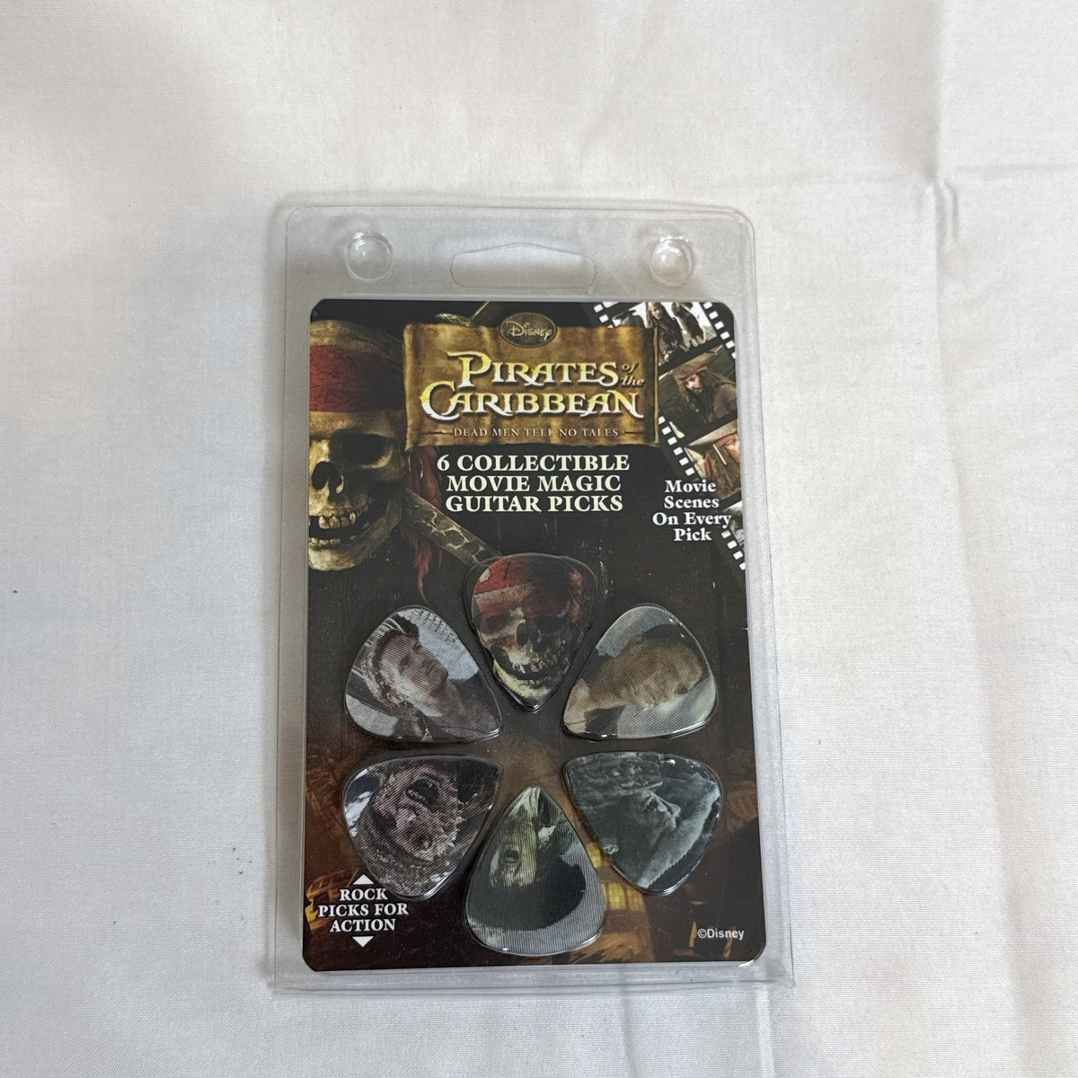 Sealed Disney and Tim Burton accessory set featuring Nightmare Before Christmas pins, Scissorhands earrings, and picks