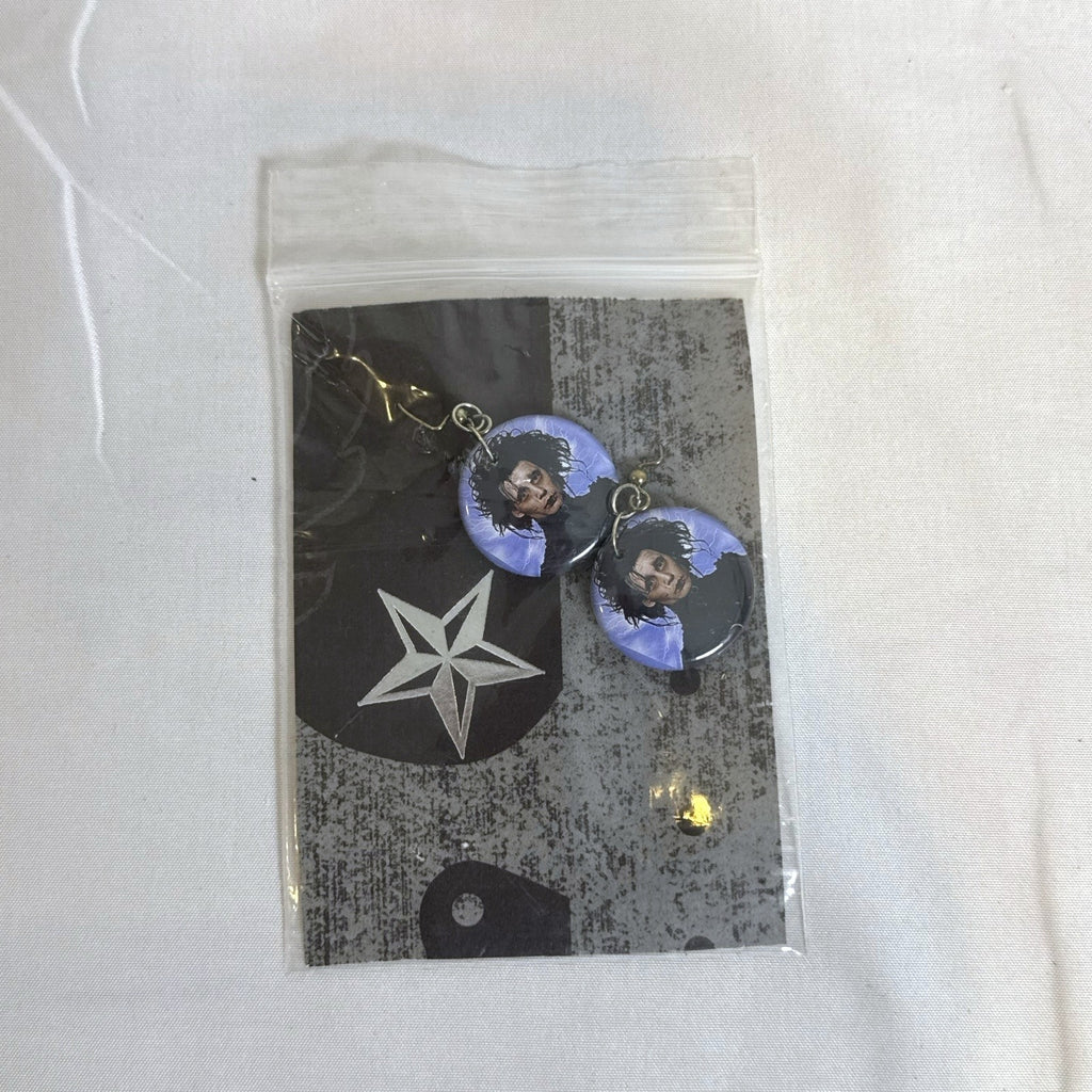 Sealed Disney and Tim Burton accessory set featuring Nightmare Before Christmas pins, Scissorhands earrings, and picks