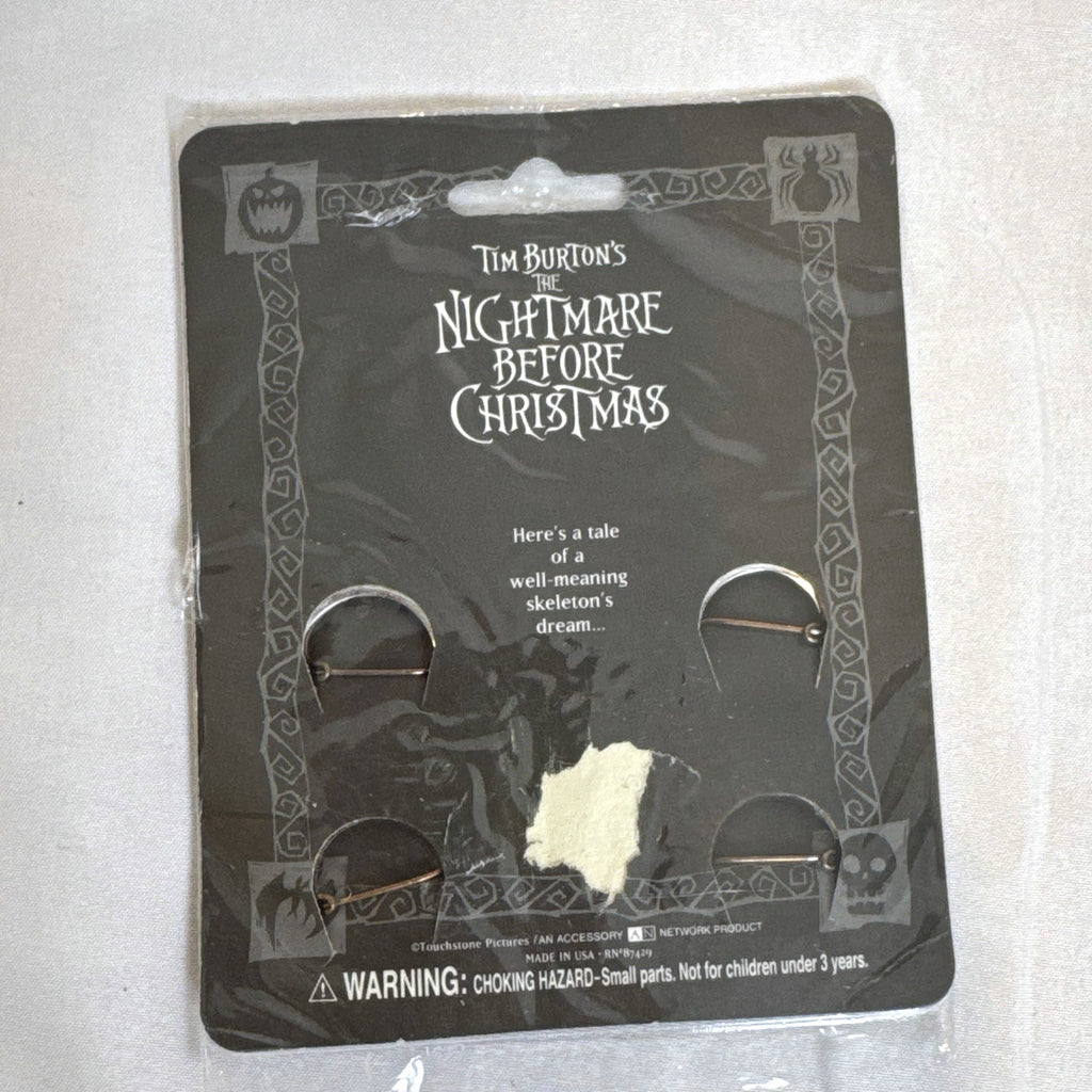 Sealed Disney and Tim Burton accessory set featuring Nightmare Before Christmas pins, Scissorhands earrings, and picks