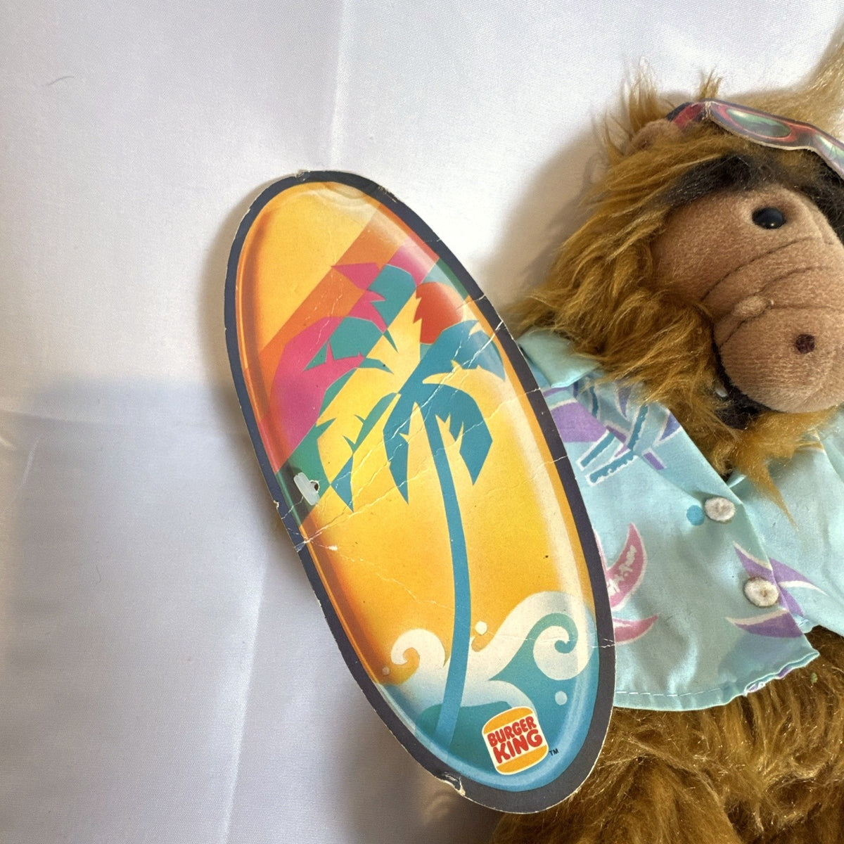 Vintage 1988 Burger King Alf hand puppet holding surfboard with original tags attached