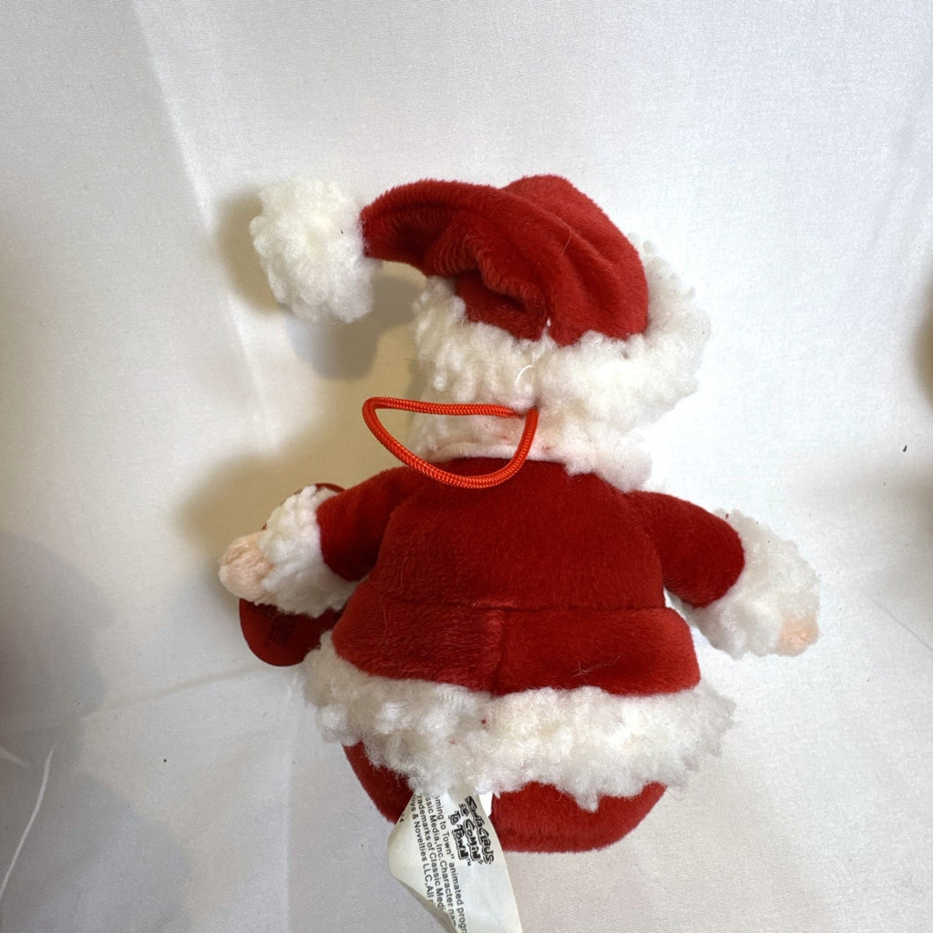 Set of 4 NWT 2003 Stuffins Santa Claus Is Comin' To Town plush ornaments including Kris Kringle and Winter Warlock