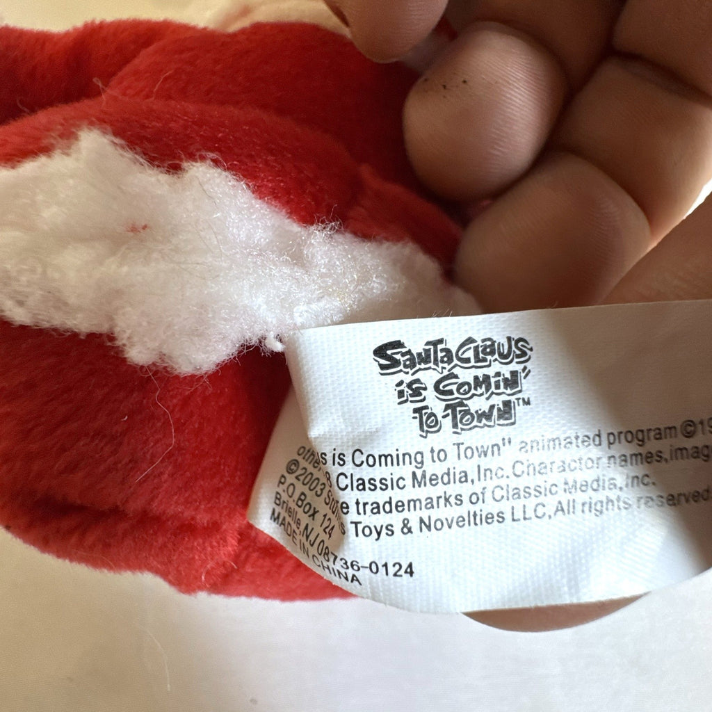 Set of 4 NWT 2003 Stuffins Santa Claus Is Comin' To Town plush ornaments including Kris Kringle and Winter Warlock