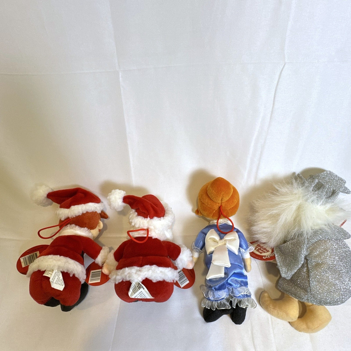 Set of 4 NWT 2003 Stuffins Santa Claus Is Comin' To Town plush ornaments including Kris Kringle and Winter Warlock
