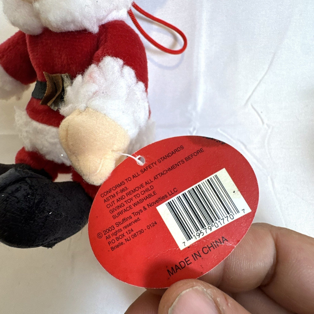 Set of 4 NWT 2003 Stuffins Santa Claus Is Comin' To Town plush ornaments including Kris Kringle and Winter Warlock