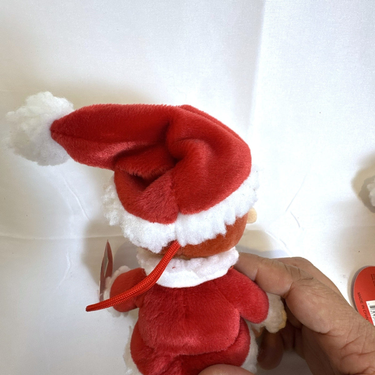 Set of 4 NWT 2003 Stuffins Santa Claus Is Comin' To Town plush ornaments including Kris Kringle and Winter Warlock