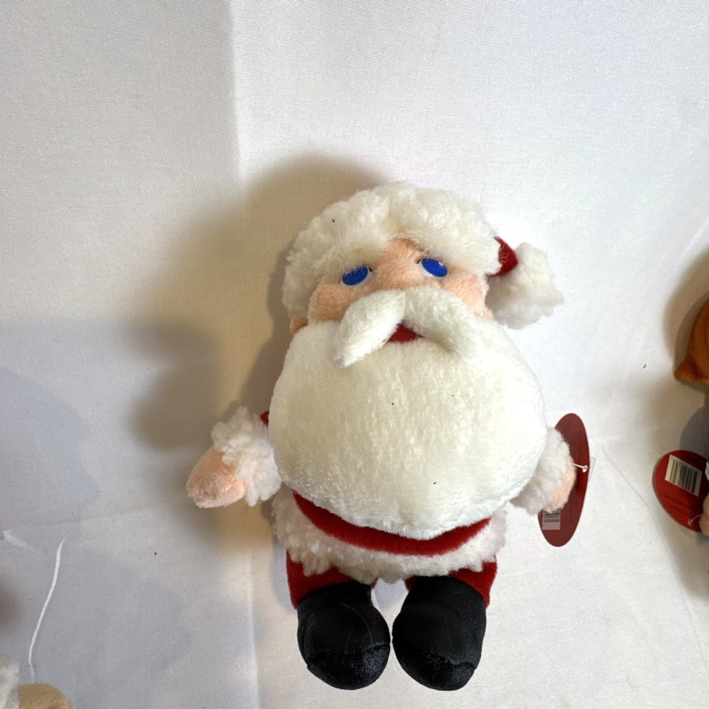Set of 4 NWT 2003 Stuffins Santa Claus Is Comin' To Town plush ornaments including Kris Kringle and Winter Warlock