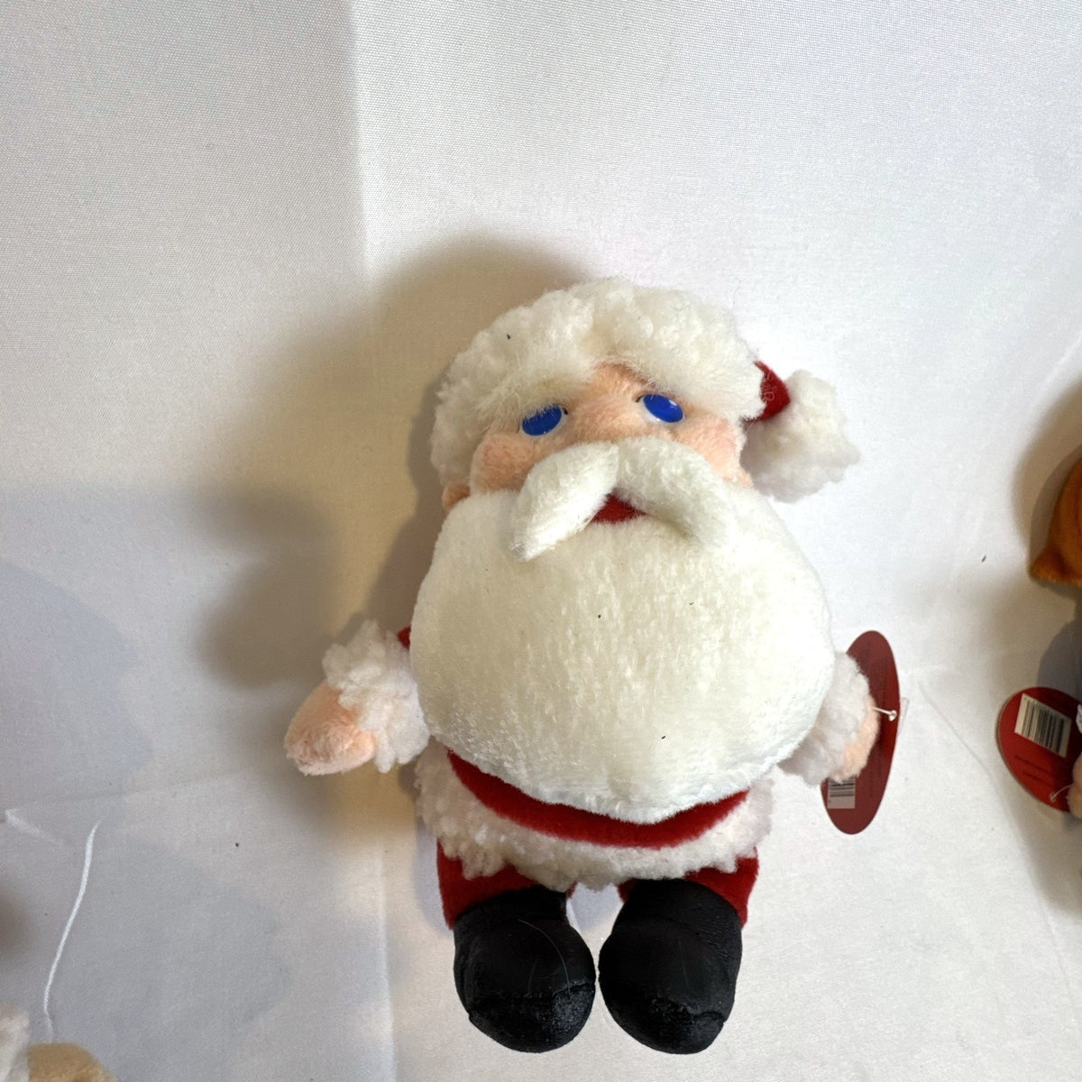 Set of 4 NWT 2003 Stuffins Santa Claus Is Comin' To Town plush ornaments including Kris Kringle and Winter Warlock