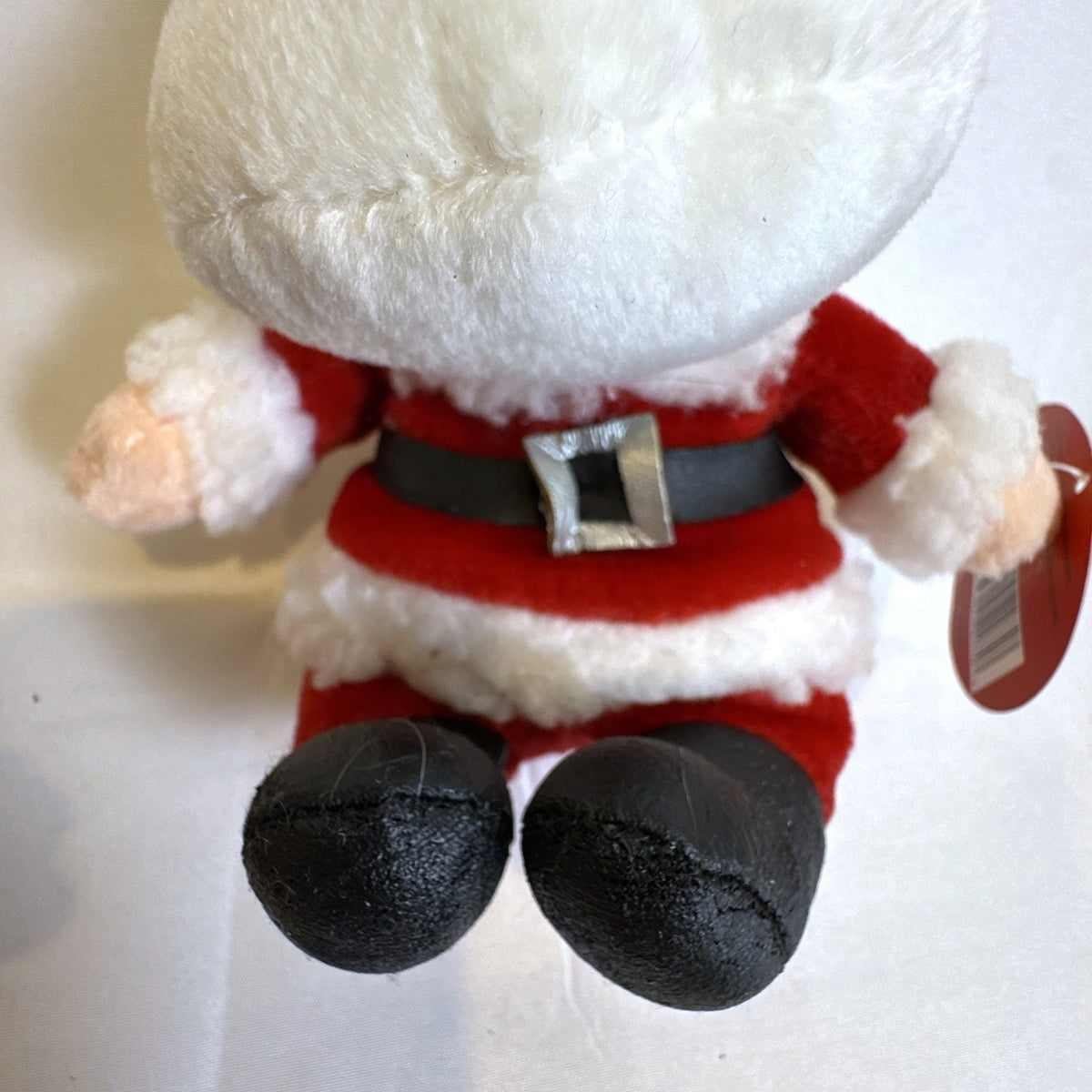 Set of 4 NWT 2003 Stuffins Santa Claus Is Comin' To Town plush ornaments including Kris Kringle and Winter Warlock