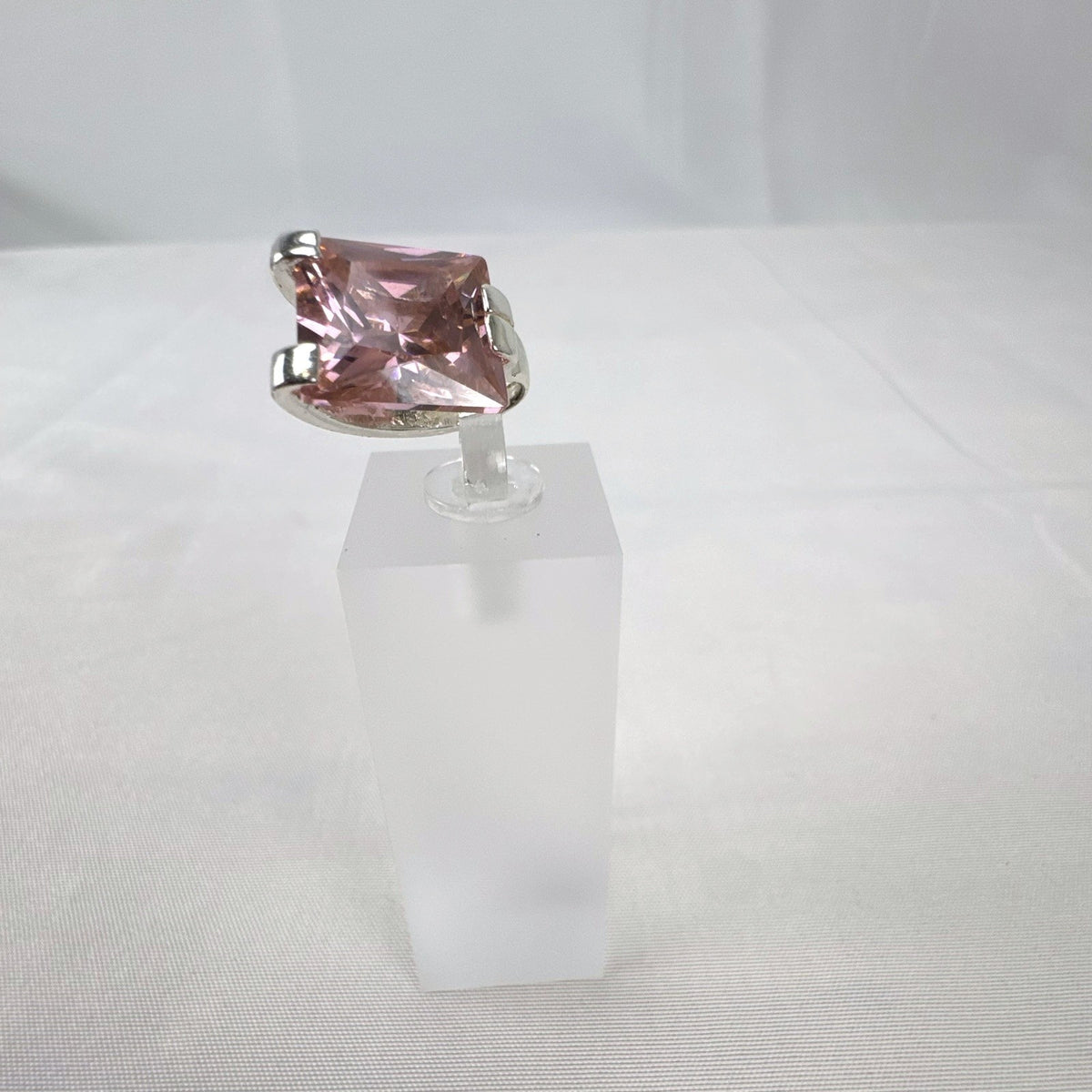 925 sterling silver slide pendant enhancer featuring a brilliant pink cubic zirconia gemstone.