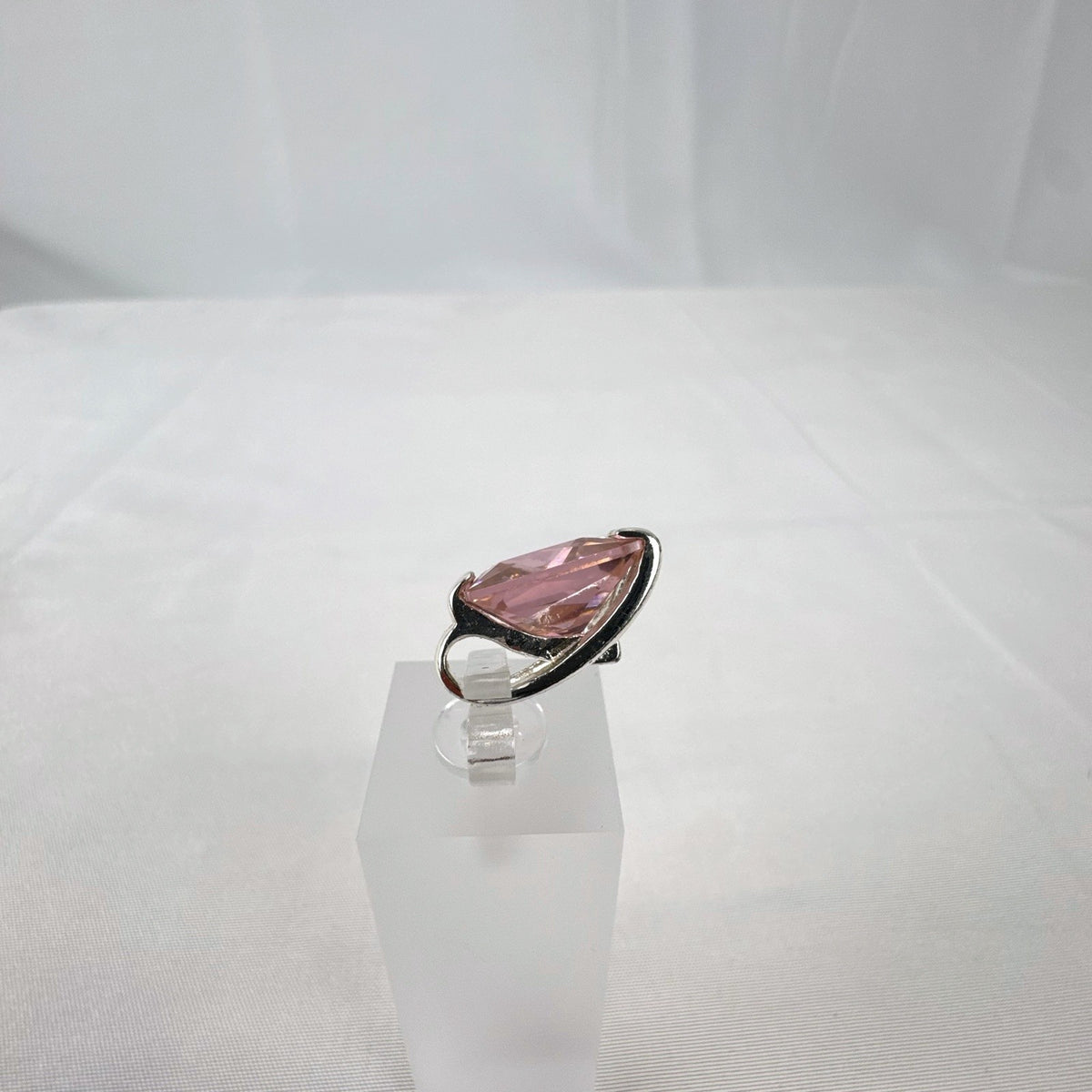 925 sterling silver slide pendant enhancer featuring a brilliant pink cubic zirconia gemstone.