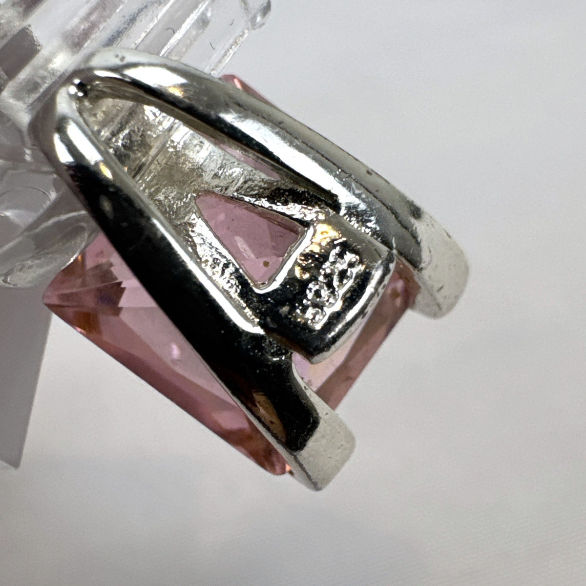 925 sterling silver slide pendant enhancer featuring a brilliant pink cubic zirconia gemstone.