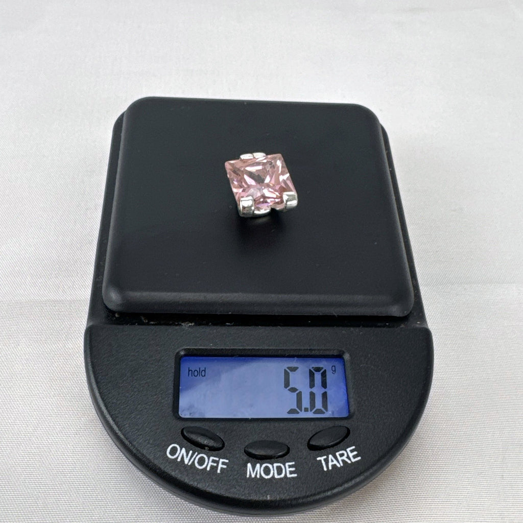 925 sterling silver slide pendant enhancer featuring a brilliant pink cubic zirconia gemstone.