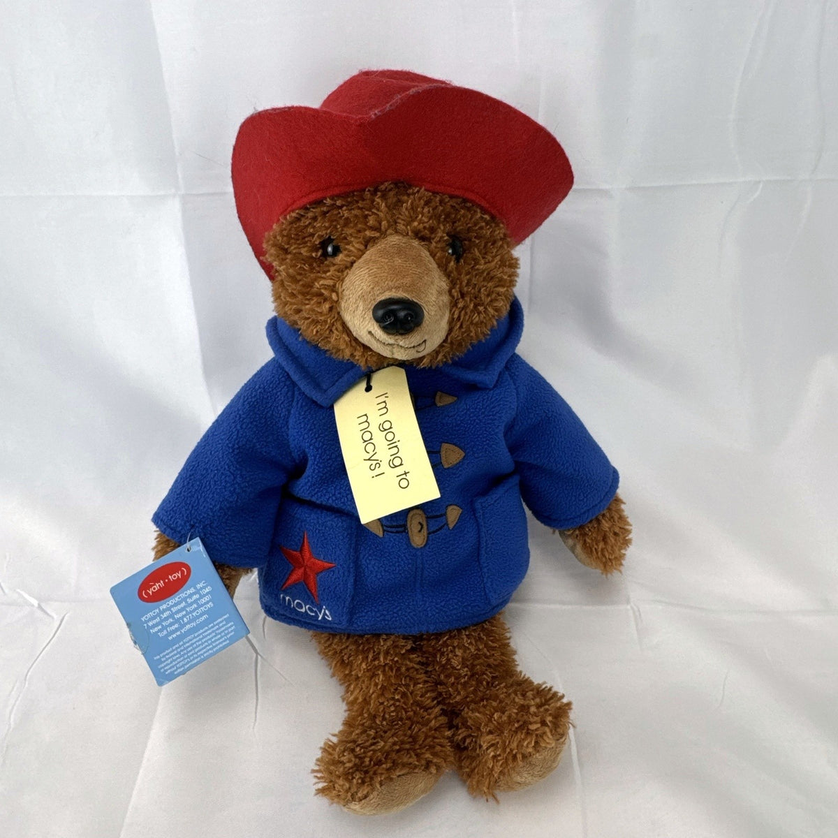 2014 Yottoy 11-inch Paddington Bear plush with blue fleece duffle coat, red hat, and Macy's luggage tag