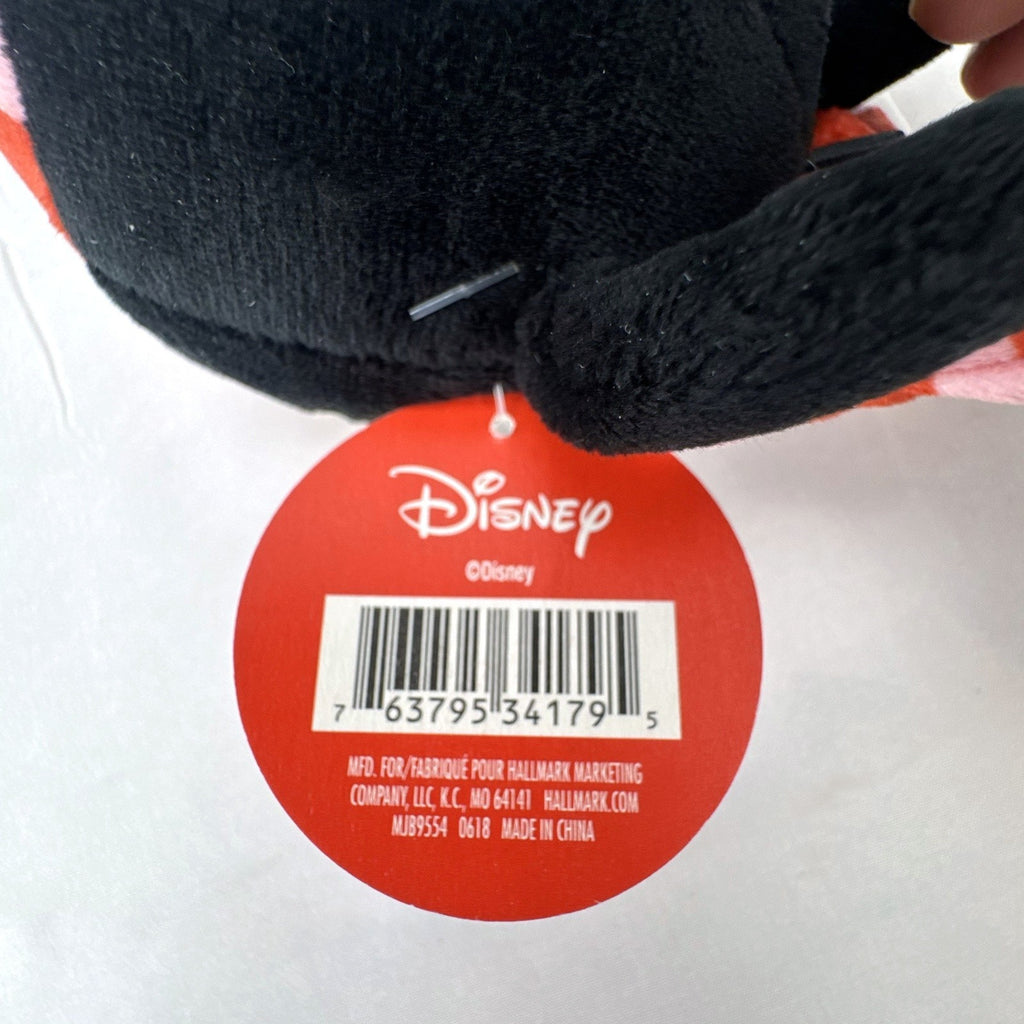 Hallmark Fluffballs Disney Minnie Mouse 4 inch plush ornament with red polka dot bow and new tags attached.