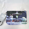 New Disney The Nightmare Before Christmas small black cosmetic pouch featuring character artwork and a wrist strap