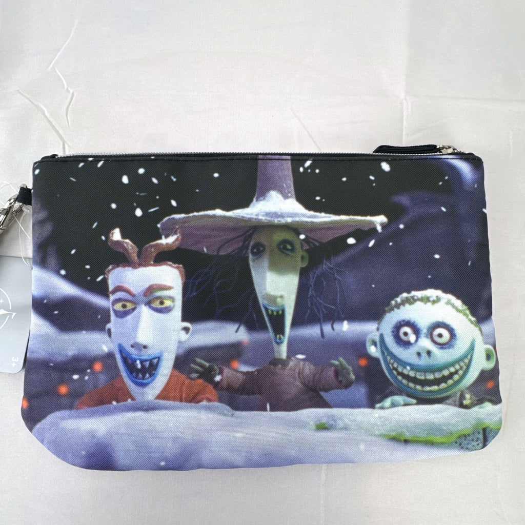 New Disney The Nightmare Before Christmas small black cosmetic pouch featuring character artwork and a wrist strap