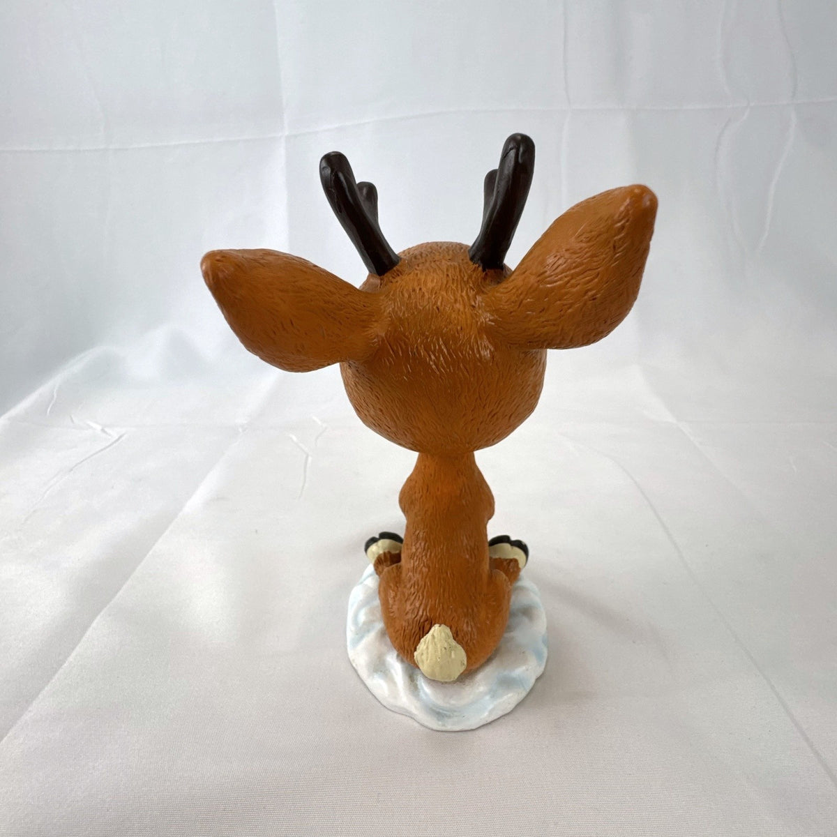 BD&A 6 inch painted ceramic Rudolph the Red-Nosed Reindeer bobblehead holiday figurine.