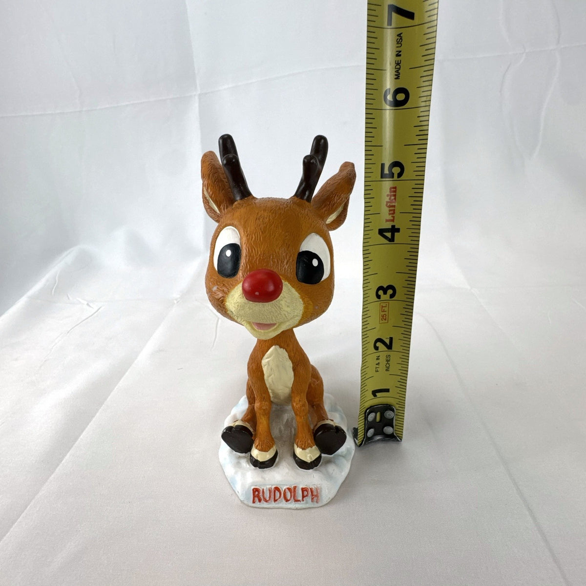 BD&A 6 inch painted ceramic Rudolph the Red-Nosed Reindeer bobblehead holiday figurine.