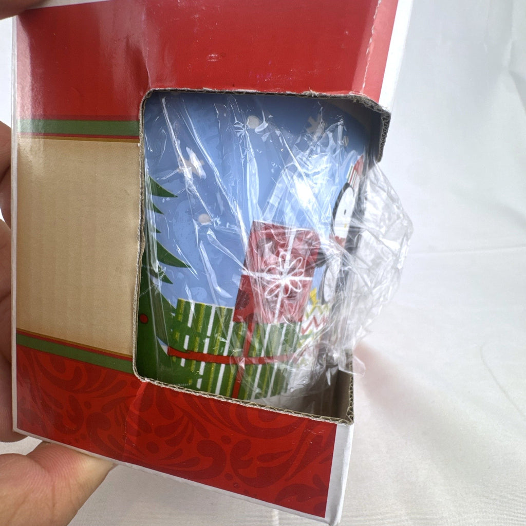 Greenbrier 14 oz blue ceramic holiday coffee mug featuring a bundled winter penguin design in original box