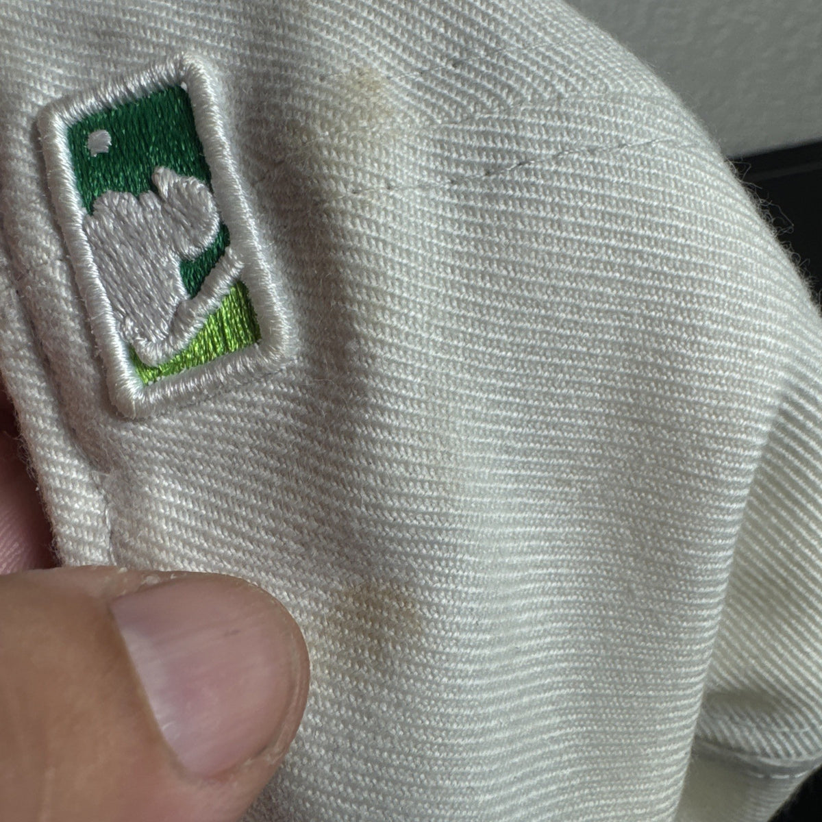 New Era 59FIFTY Oakland Athletics fitted cap in size 7 1/8 featuring green and white argyle front panels.