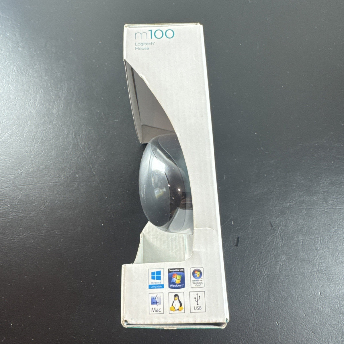 Brand new black Logitech M100 wired USB optical computer mouse in original packaging.