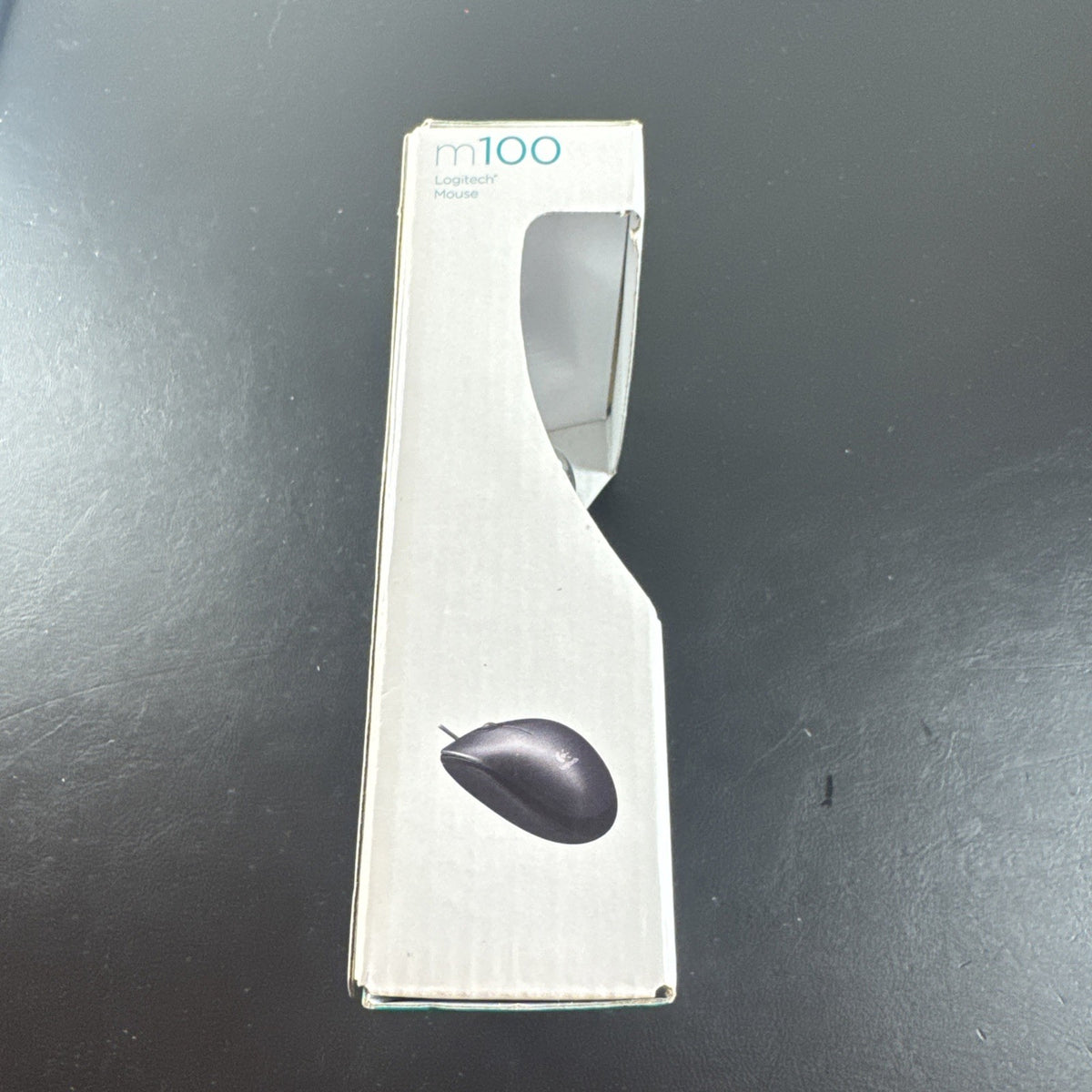 Brand new black Logitech M100 wired USB optical computer mouse in original packaging.