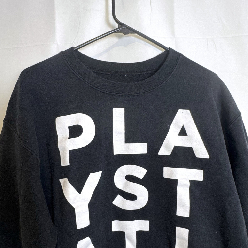 Ripple Junction PlayStation stacked text logo crewneck sweatshirt in black, men's size medium.