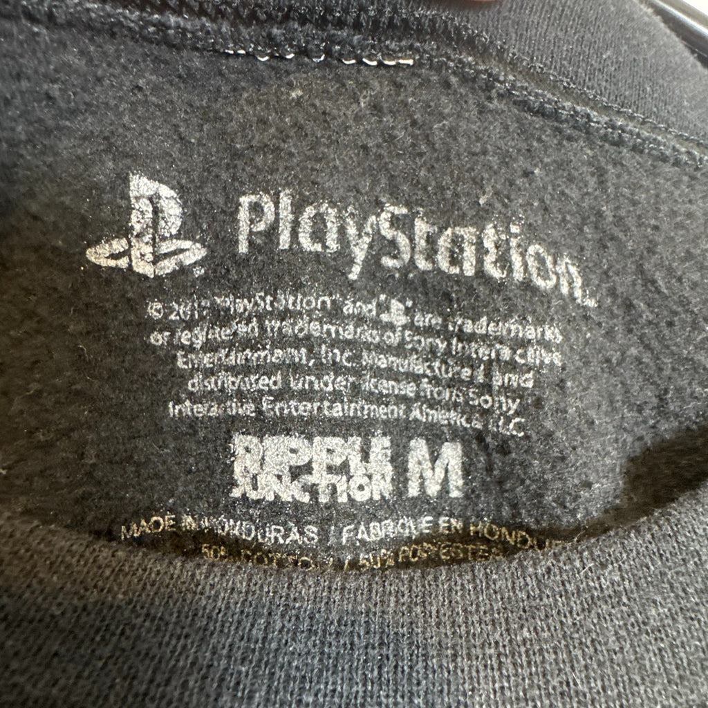 Ripple Junction PlayStation stacked text logo crewneck sweatshirt in black, men's size medium.