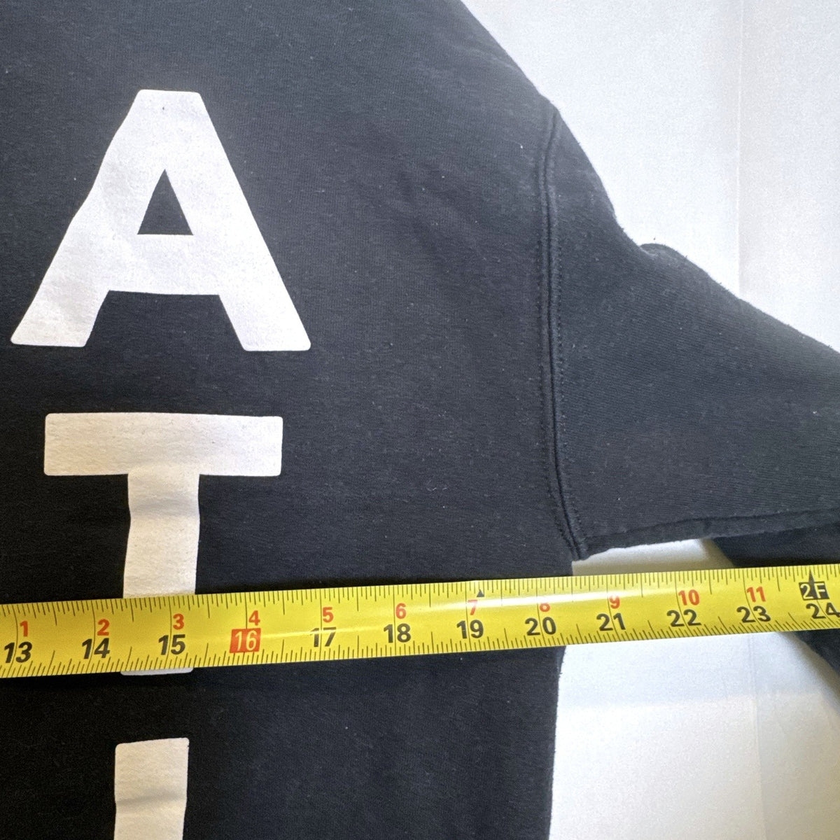 Ripple Junction PlayStation stacked text logo crewneck sweatshirt in black, men's size medium.