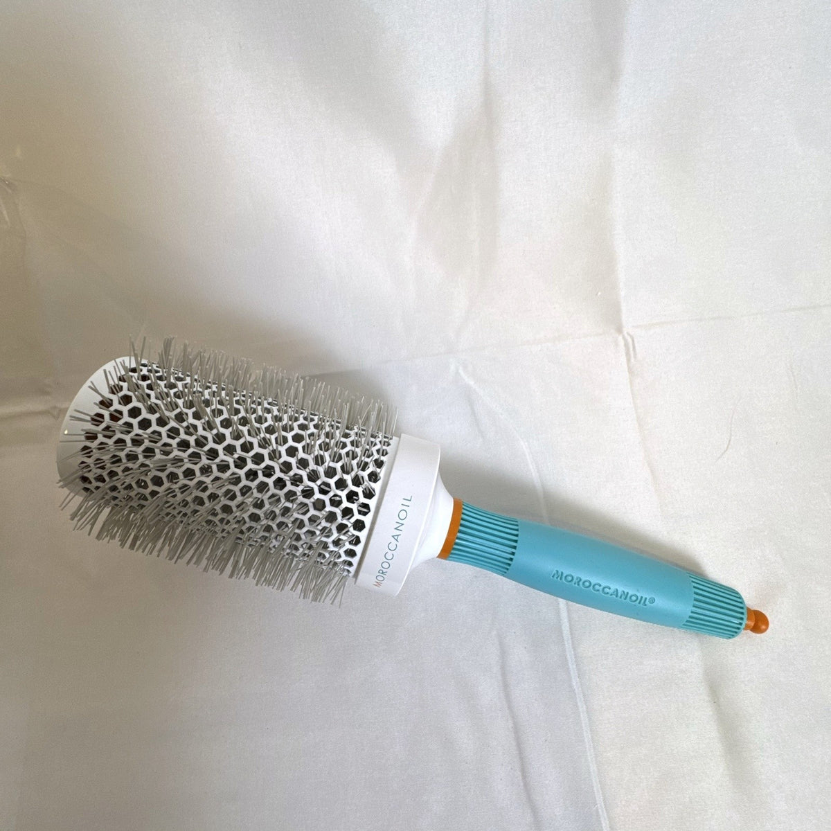 New Moroccanoil 55mm ceramic round brush and Shu Uemura Acca Kappa paddle brush set in original packaging