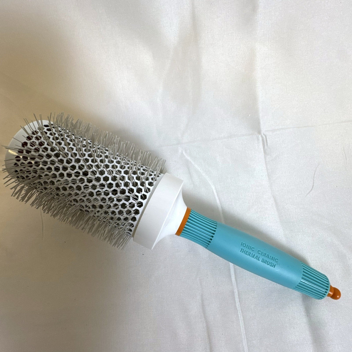 New Moroccanoil 55mm ceramic round brush and Shu Uemura Acca Kappa paddle brush set in original packaging
