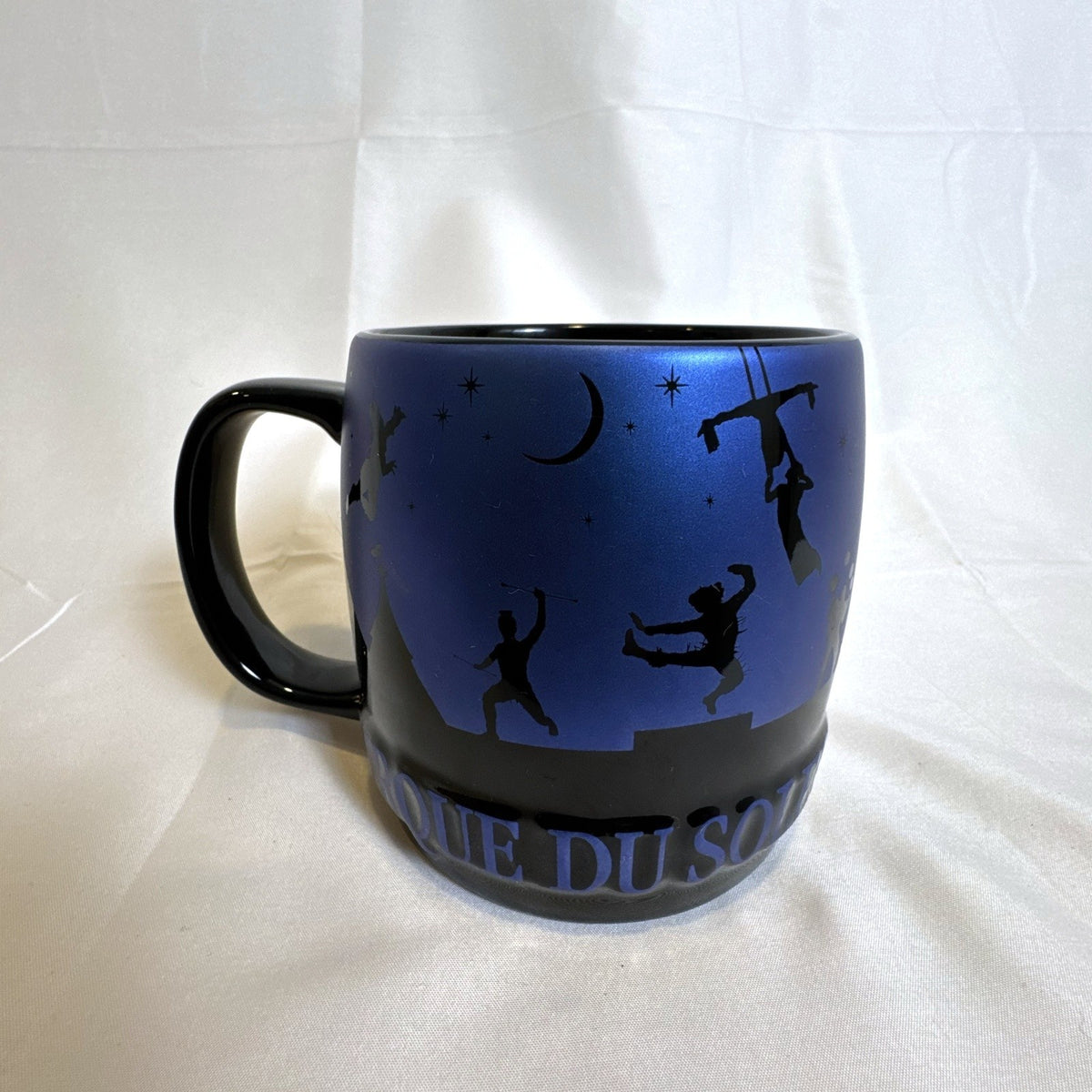 Cirque du Soleil 2015 oversized black ceramic mug featuring a starry night sky design