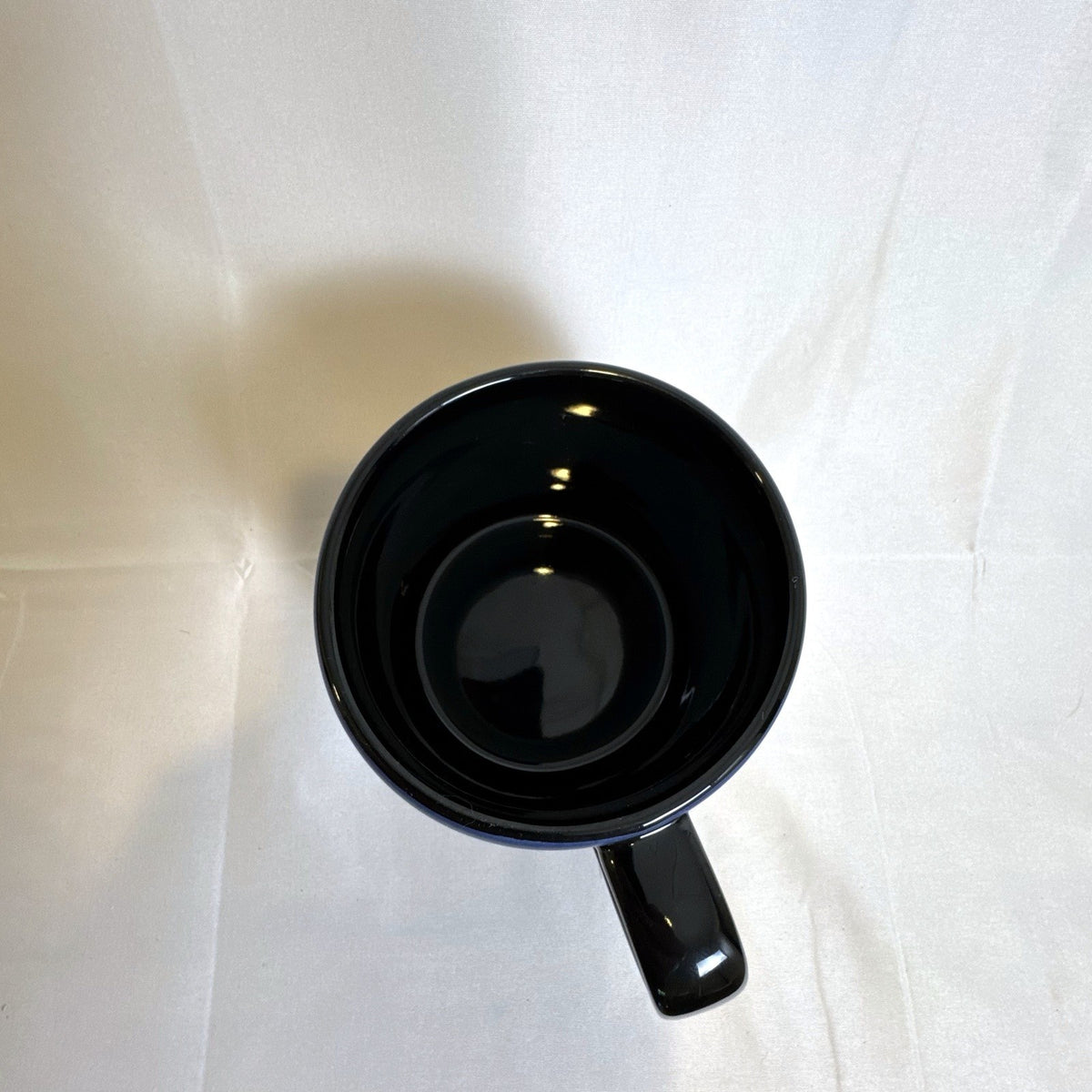 Cirque du Soleil 2015 oversized black ceramic mug featuring a starry night sky design