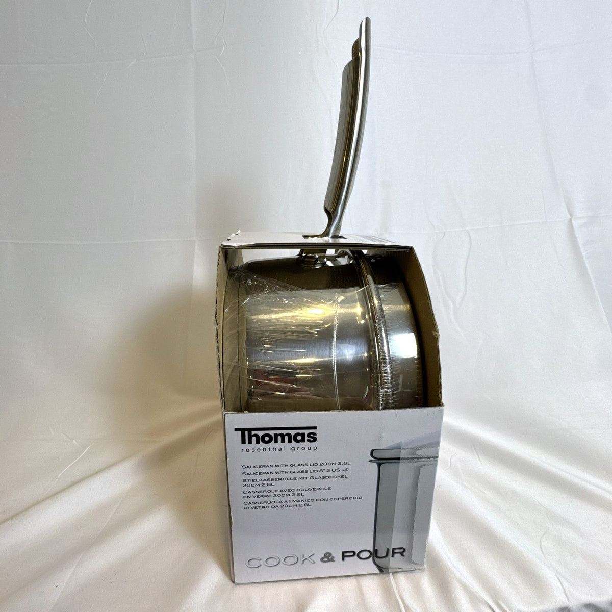 New Thomas Rosenthal 1-liter stainless steel cook and pour saucepan with tempered glass straining lid.
