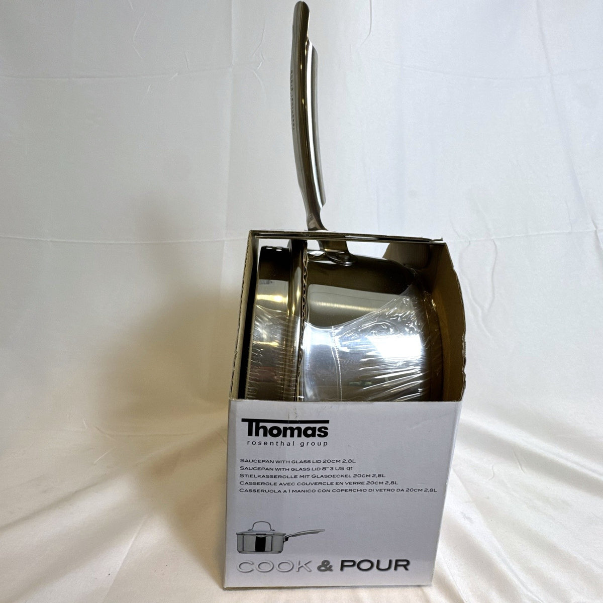 New Thomas Rosenthal 1-liter stainless steel cook and pour saucepan with tempered glass straining lid.