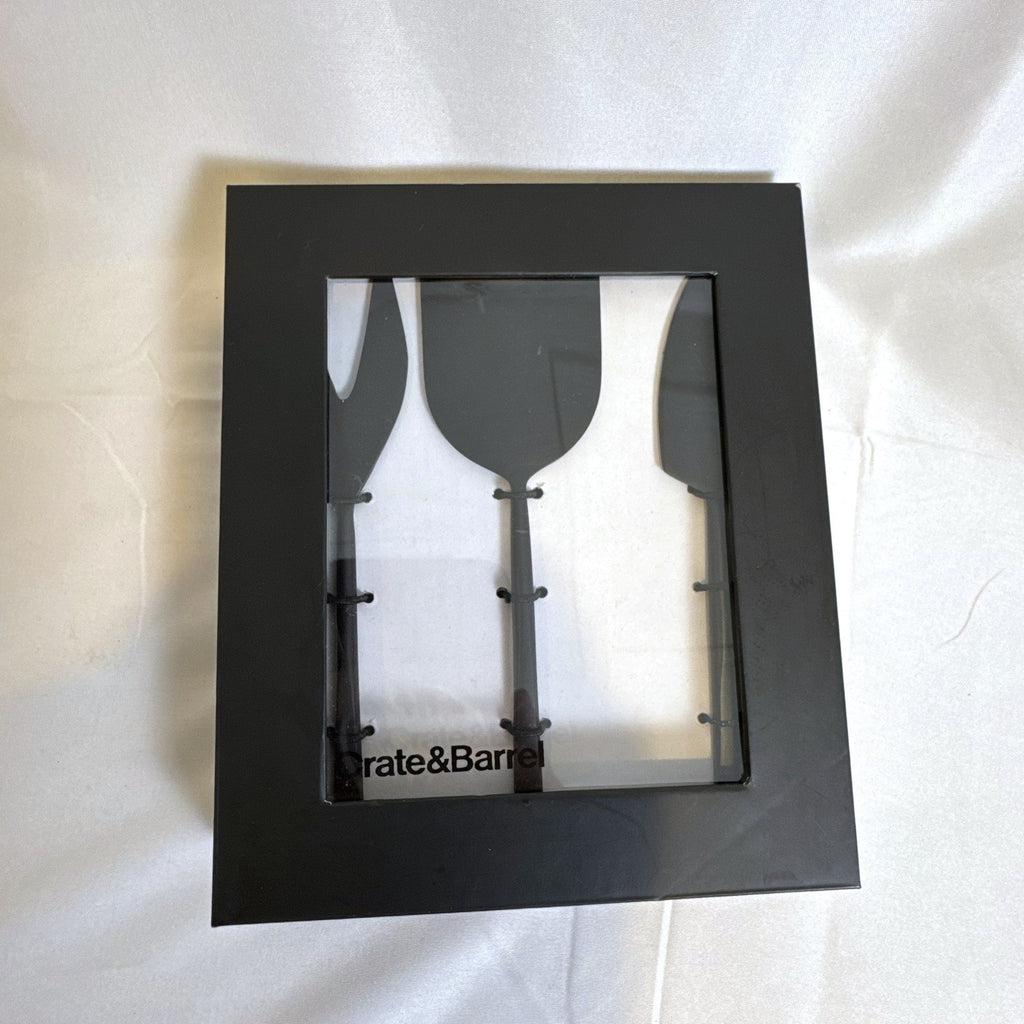 Crate and Barrel matte black stainless steel cheese knife set for charcuterie serving