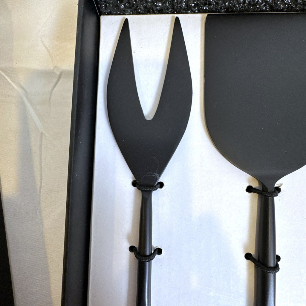 Crate and Barrel matte black stainless steel cheese knife set for charcuterie serving