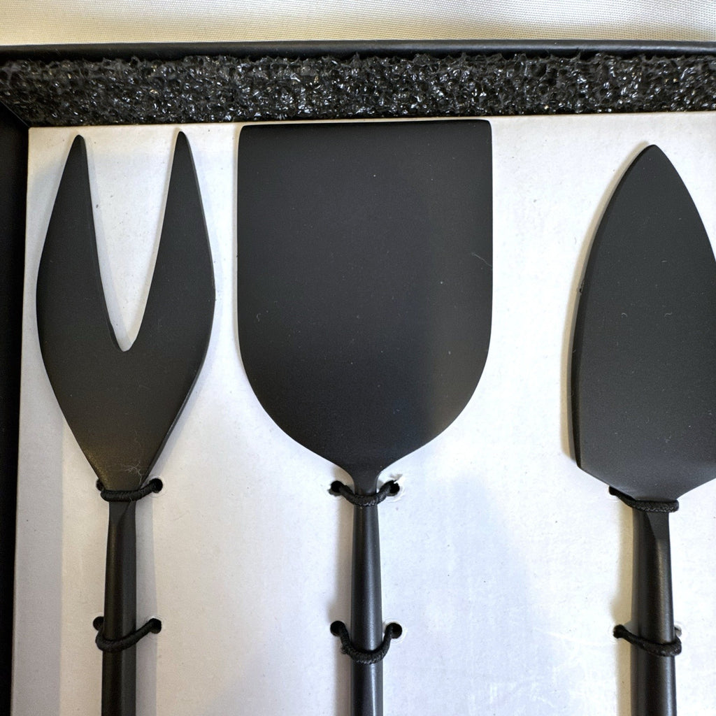Crate and Barrel matte black stainless steel cheese knife set for charcuterie serving