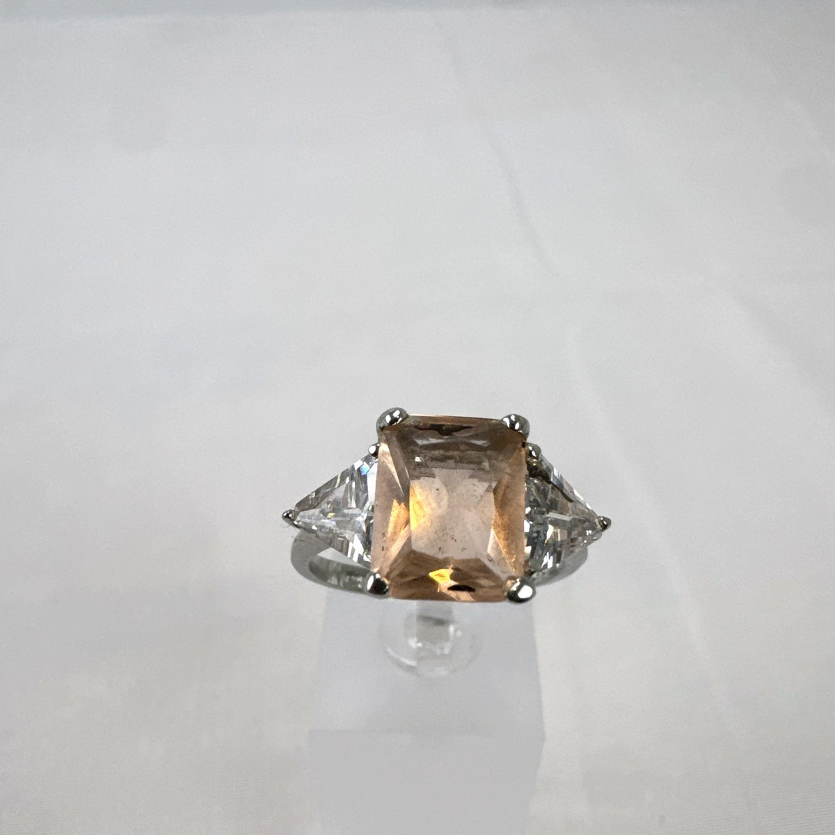 DBJ 925 sterling silver 3-stone ring with champagne emerald-cut CZ and clear trillion side stones size 7