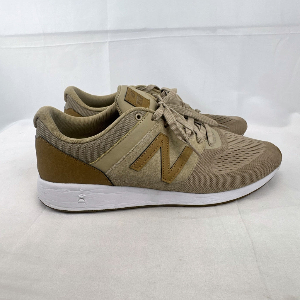 Men's New Balance 009 low-top running shoes in tan mesh and beige suede, size 12