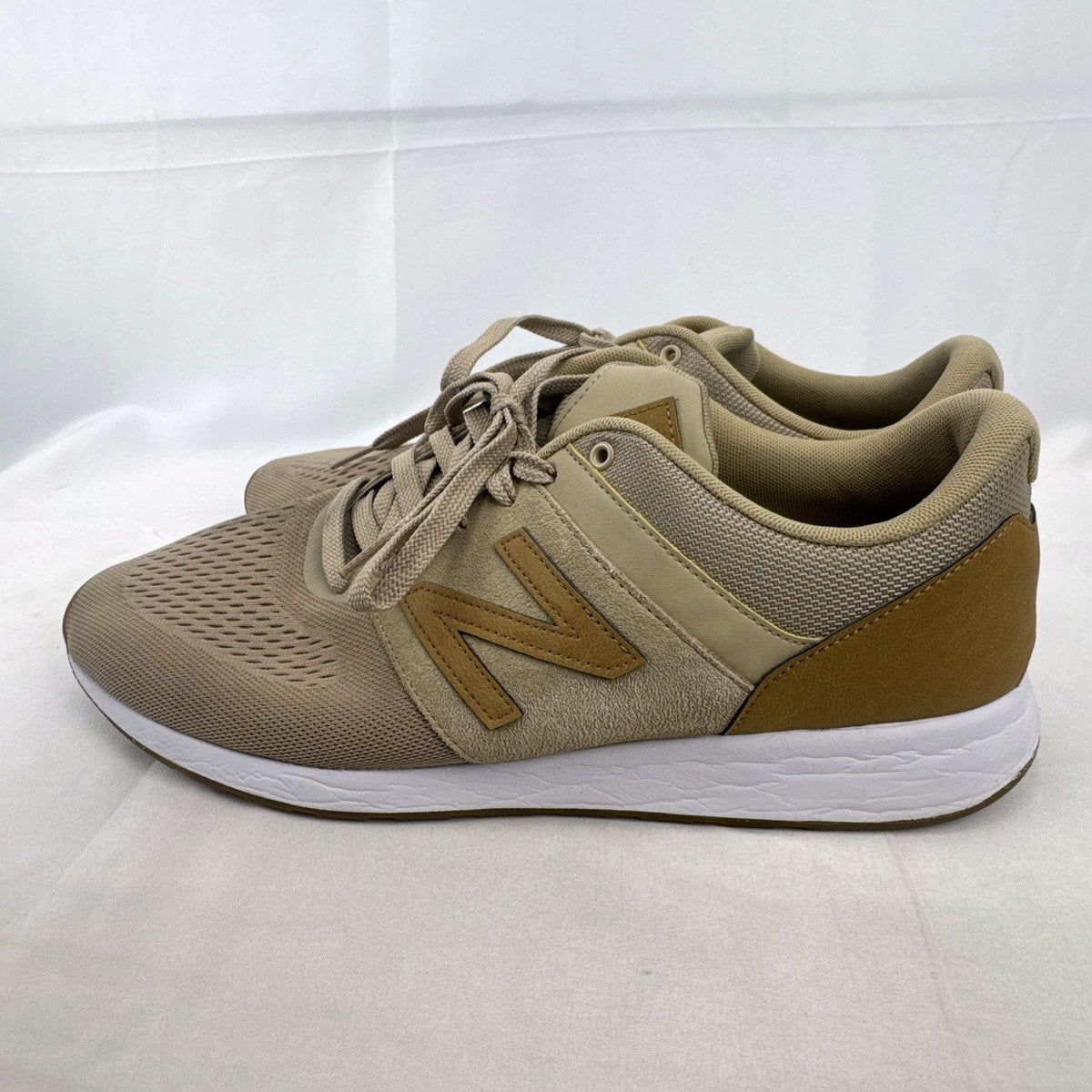 Men's New Balance 009 low-top running shoes in tan mesh and beige suede, size 12